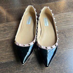 Black and Beige patent leather flats with studs